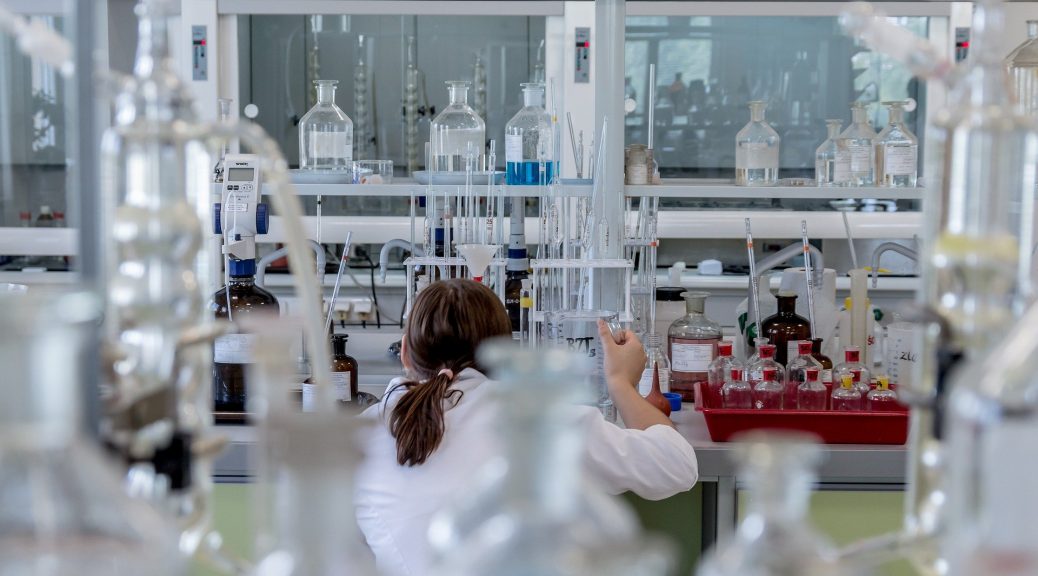 Interkleen's Laboratory Cleaning Service. Woman working in lab