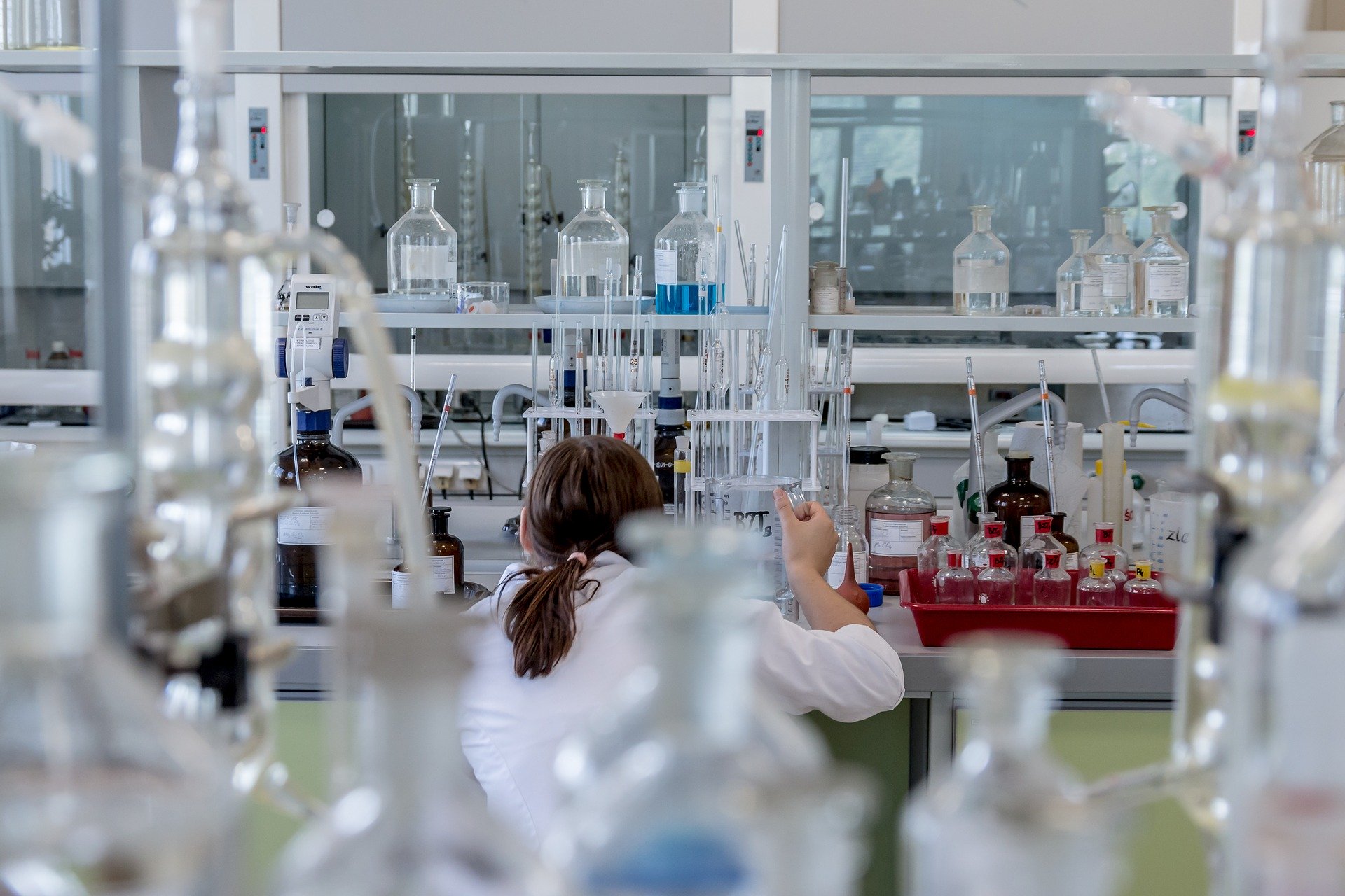 Interkleen's Laboratory Cleaning Service. Woman working in lab